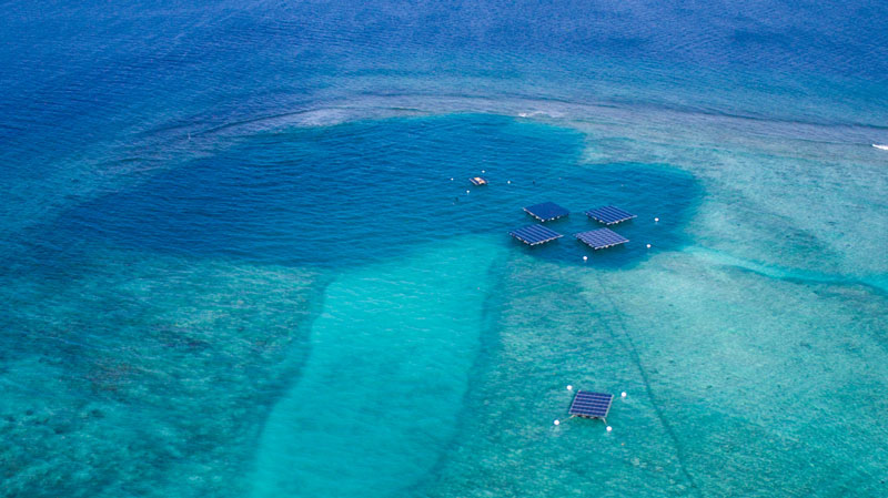 several offshore floating solar energy platforms and prototypes by Swimsol floating at sea in the Maldives