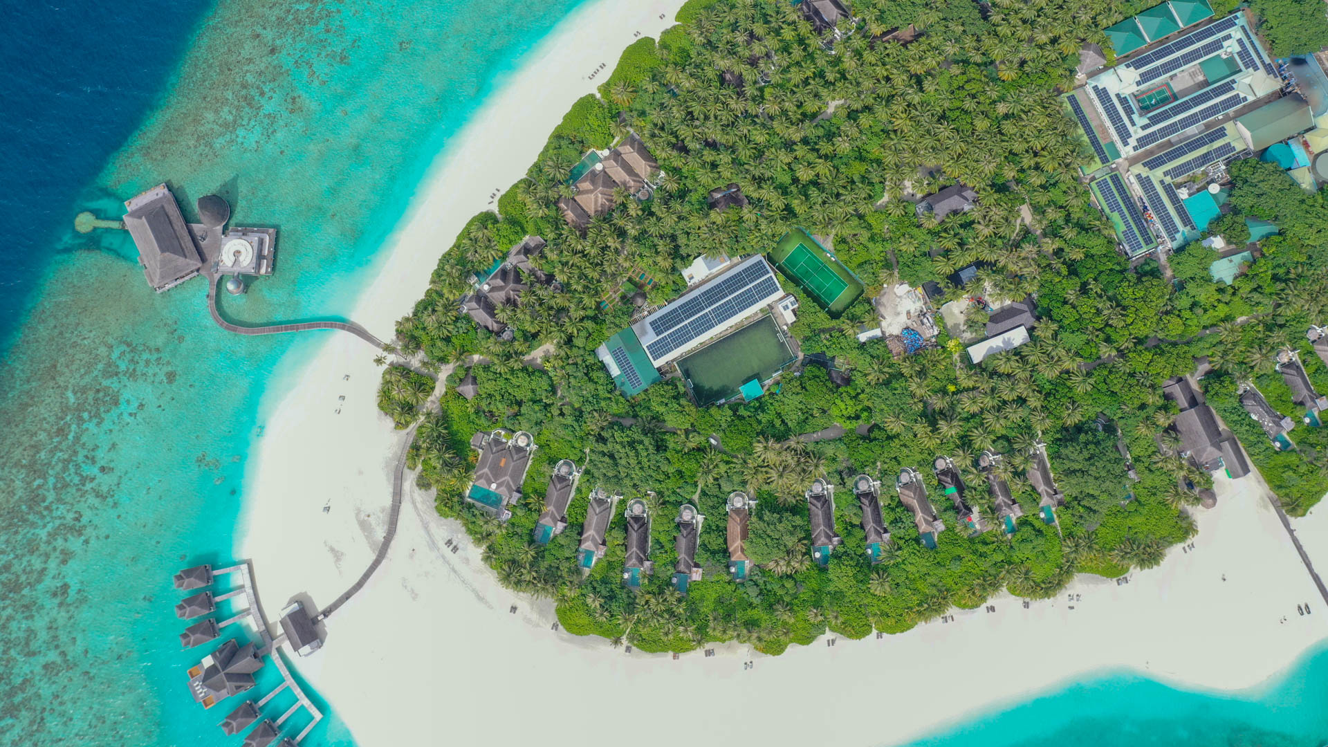 Aerial view of a beautiful Rooftop solar PV system by Swimsol at Anantara Kihavah Maldives