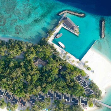 Beautiful solar power installation on water villas at OBLU resort in the Maldives