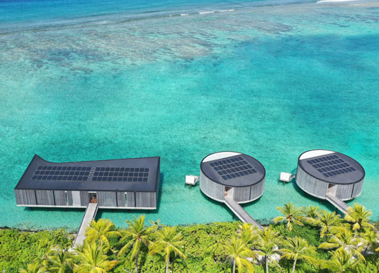 Beautiful solar panel installation on water villas at Ritz Carlton resort in the Maldives