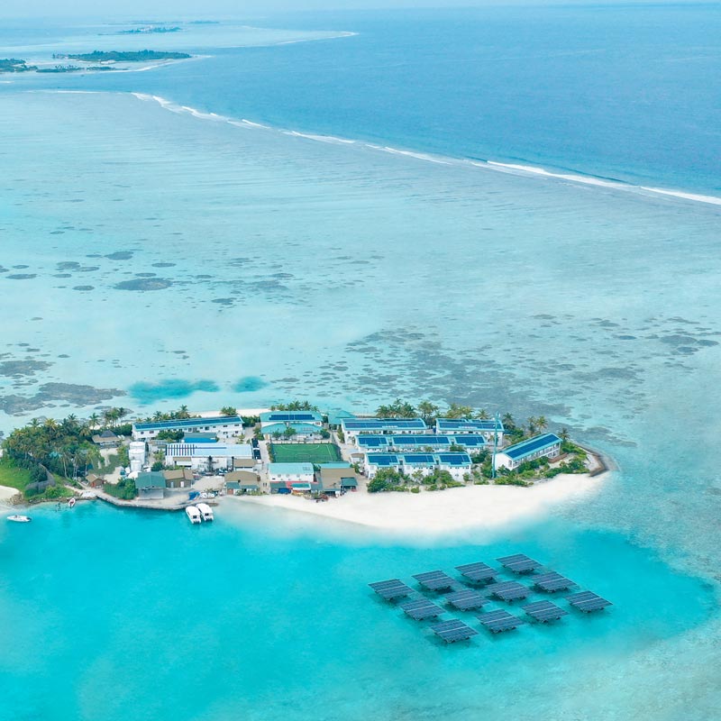 Aerial view of a rooftop and solarsea installation at Ozen Maadhoo Maldives