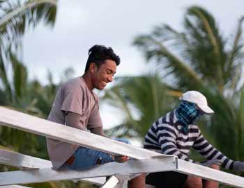 Swimsol staff working on a SolarSea floating PV construction