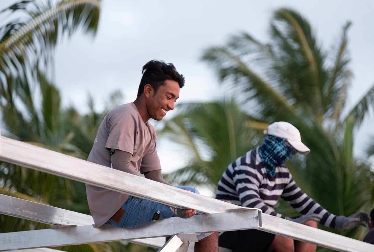 Swimsol staff working on a SolarSea floating PV construction